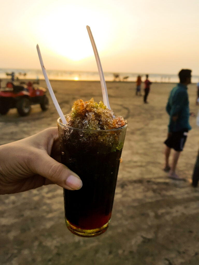Vendor selling ice gola - Diveagar Beach